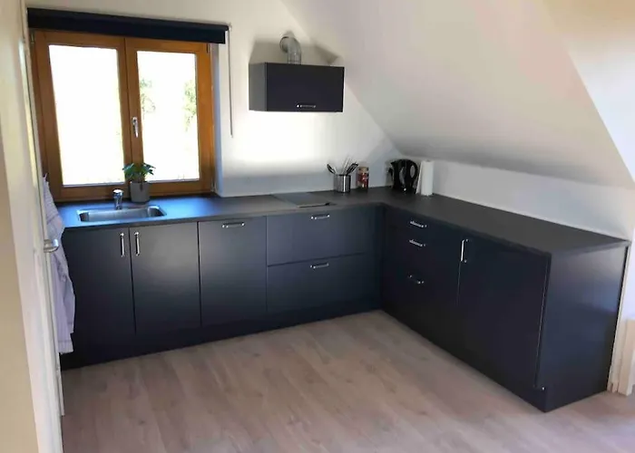 Апартаменты Bjaelkehuset